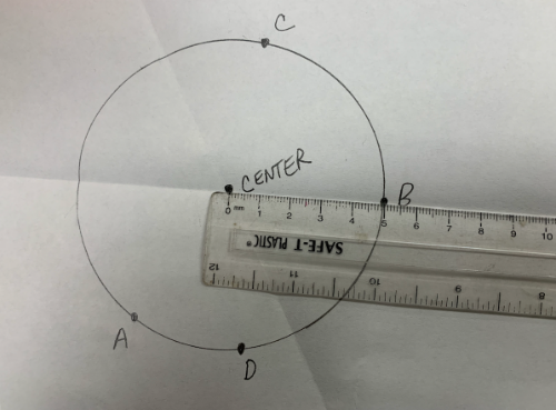 Note where your two fold lines intersect. This is the center of your circle.  You can now easily measure its radius. 