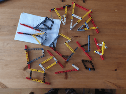 Drawing algebraic curves with LEGO-linkages